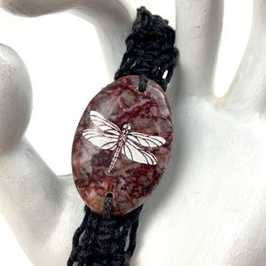 Dragonfly carved rock bead featured in macrame bracelet drawstring closure